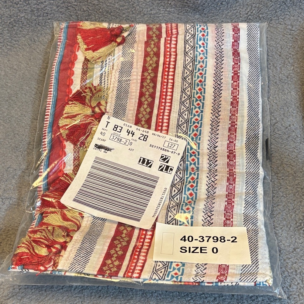 Woman Within Red and Blue Geometric Scarf